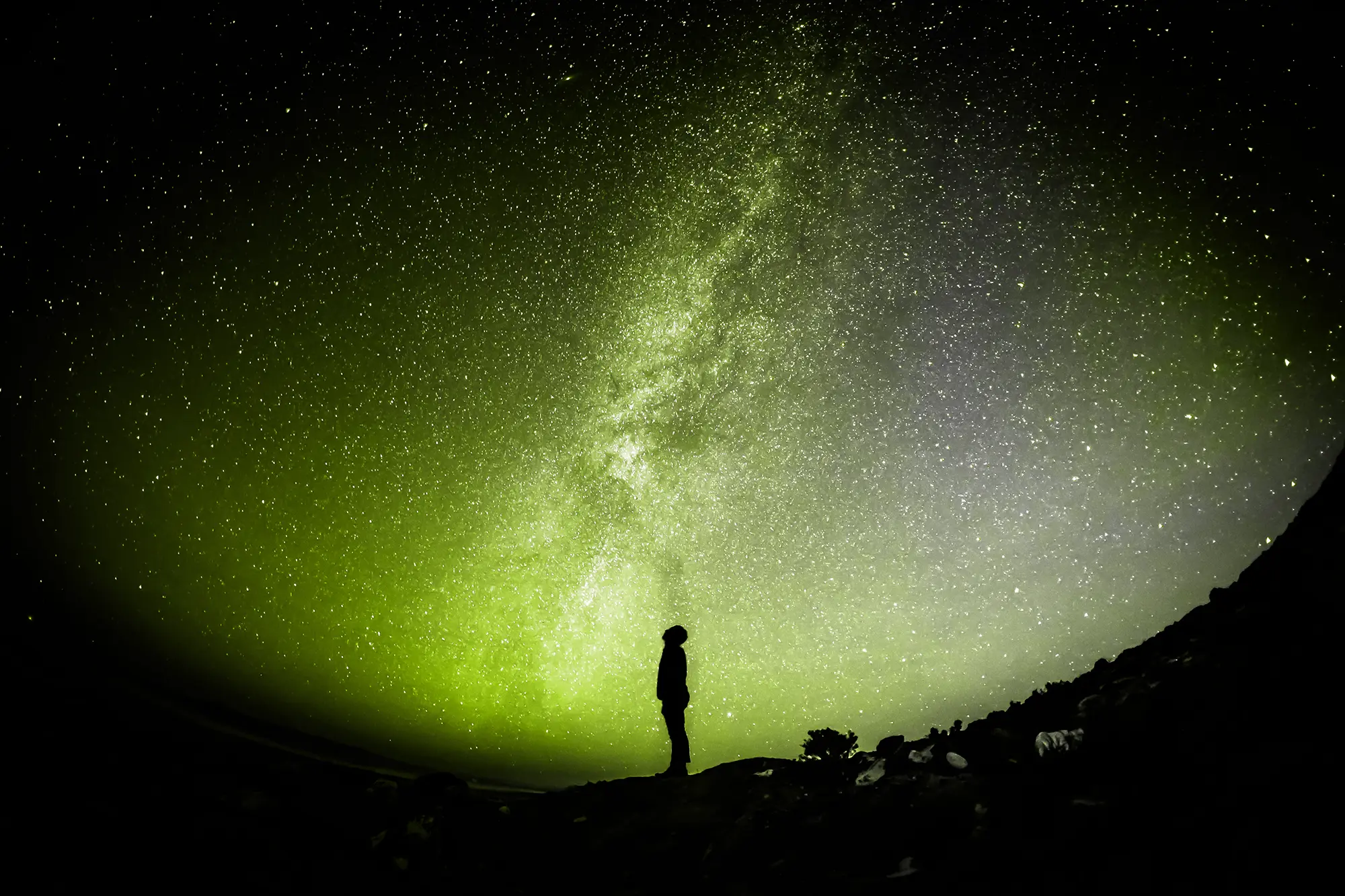 Person standing under the Milky Way — Clearing global payments